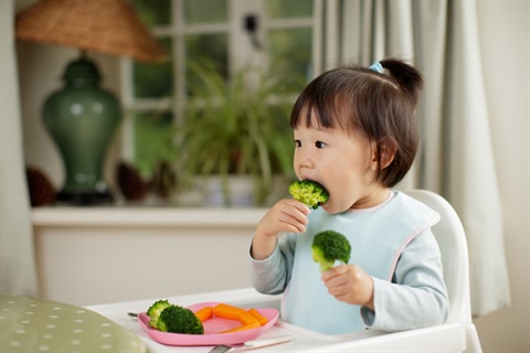 A child eating food.